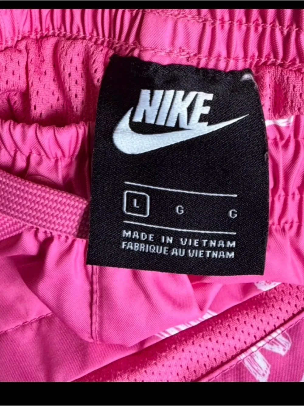 Nike Men’s Pink Allover Logo Athletic Shorts